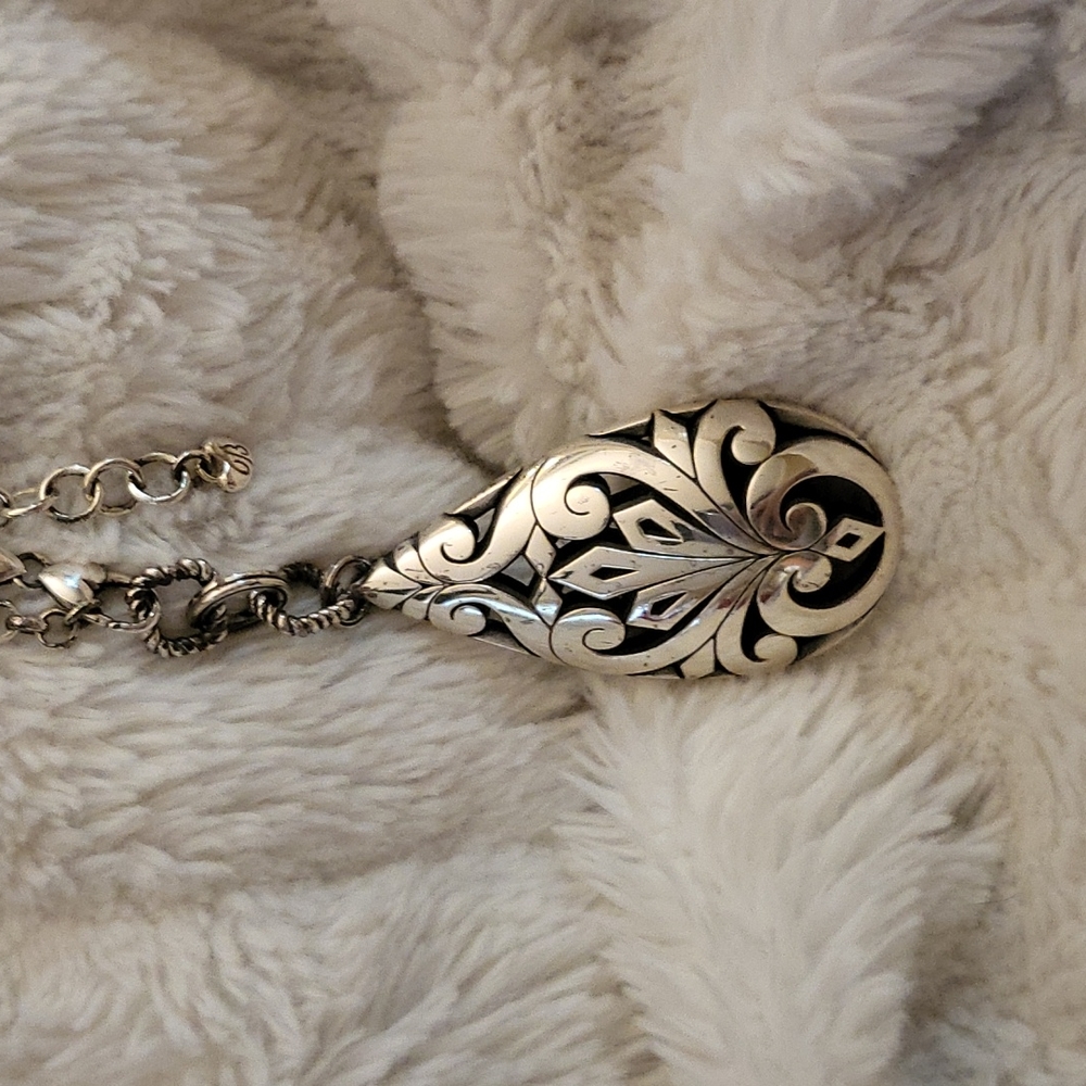 Brighton long silver pendant necklace. 39 in chain.